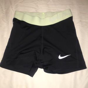 Lime green black nike pros